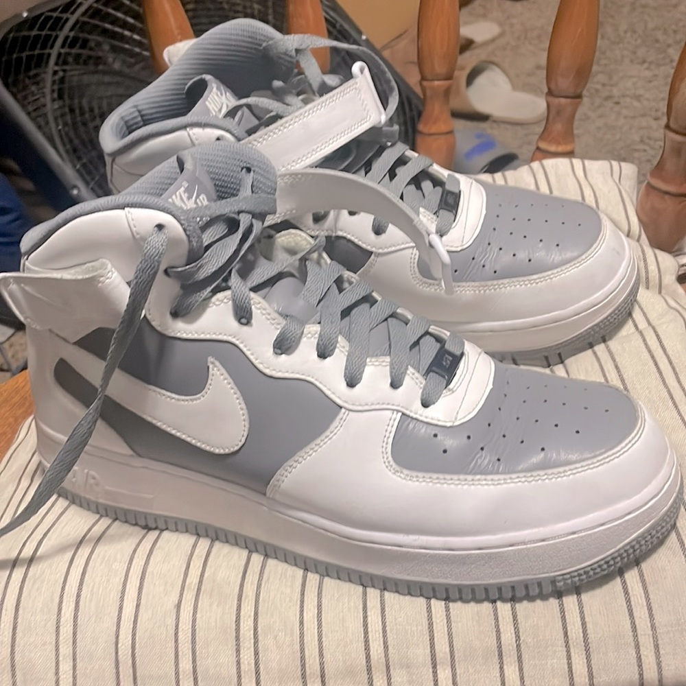 Nike Air Force 1s high tops with strap
